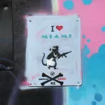 Banksy Hates Me FL Wynwood machine gun rate ph J Rojo for BSA
