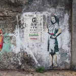 Tyler Street Art IN Mumbai eye check ph M Cooper for BSA