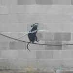 Banksy Detroit MI rat on a wire