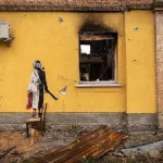 Banksy Hostomel Ukraine fighting fire