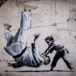 Banksy Ukraine flipping Putin