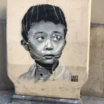 Guate Mao Paris child looking left