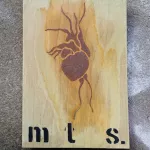 MTS heart on wood