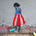 seileise child in red white blue dress