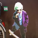 marshal arts young Joker on skateboard