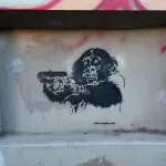 DE Berlin Alcuna monkey has a gun ph Adam K