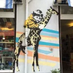 DE Berlin Child on Giraffe