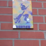 DE Hamburg playing guitar tile
