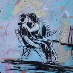 IT Rome kissing on bench photo by Peter