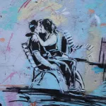 IT Rome kissing on bench ph by Peter