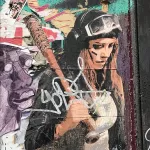 UK London Brick Ln female with bat on paper