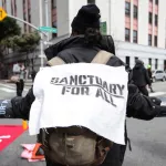 SF Financial District ICE protest photo - Ekevara Kitpowsong