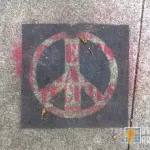SF Mission Peace sign cover up