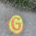 SF Mission Rainbow Coop letter G