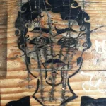 SF Mission face on wood