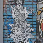 SF Mission CELLspace Woman pasteup