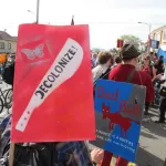 Protest May Day oakland machete decolonialize