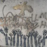 NC Asheville hands raised and bird