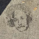 OR Portland Einstein with headphones