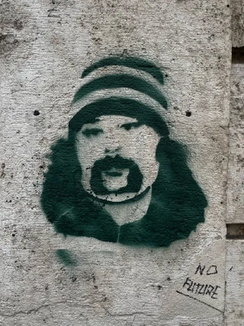 IT Rome man in hat ph Adam K