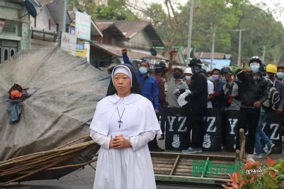 MM Protest YZ fingers reaised shields