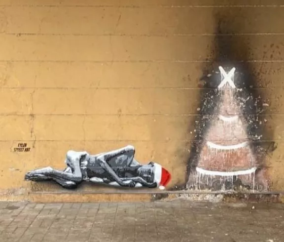Tyler Street Art IN Goa starving on xmas