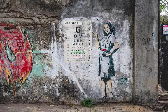 Tyler Street Art IN Mumbai eye check ph M Cooper for BSA