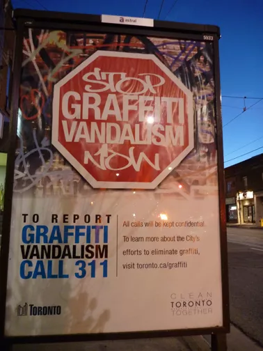 CA Toronto report graffiti poster ad