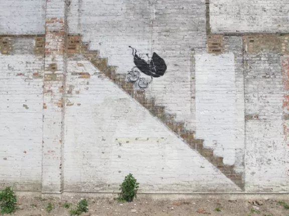 Banksy Chicago IL pram on stairs