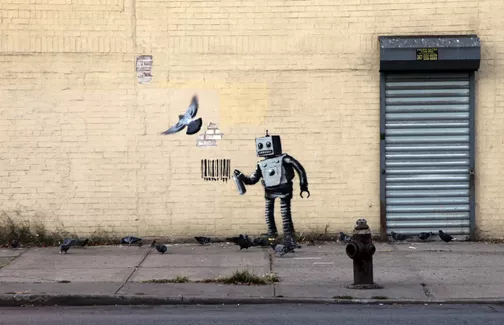Banksy NYC 2013 Coney Island robot tagger