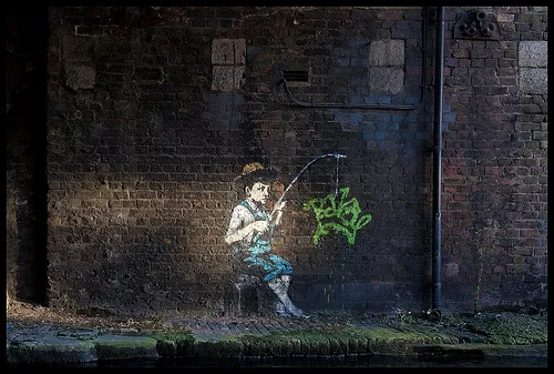 Banksy boy fishing