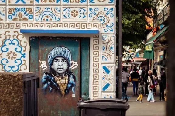 Guate Mao France Child in Blue Hat