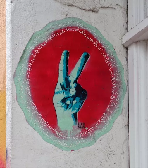 liebsein peace sign wheatpaste