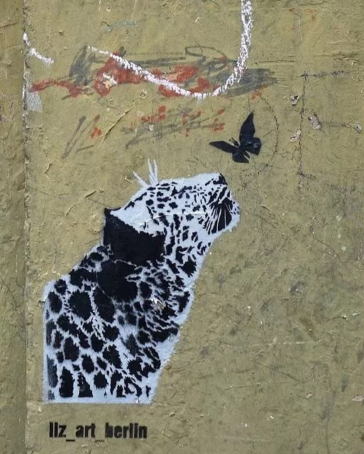 Liz Art Berlin cat sniffing butterfly