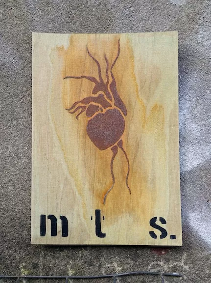 MTS heart on wood