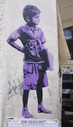 tona Berlin child holding papers