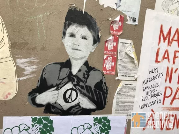 FR Paris Belleville child superman paste up
