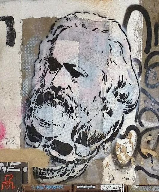 DE Berlin Marx on a skull