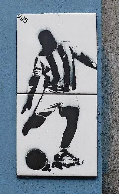 DE Berlin kicking football tile