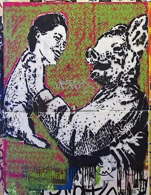 DE Berlin person and pig with switched heads