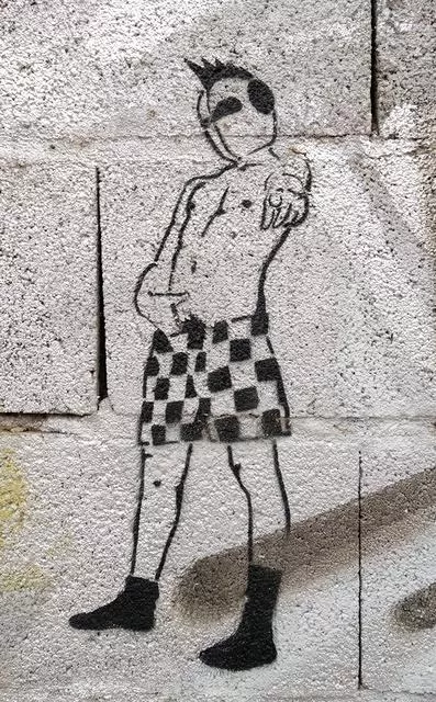 ES Malaga punk in checked shorts