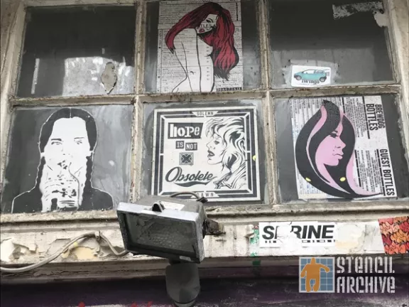 UK London Brick Ln 3 females paste up