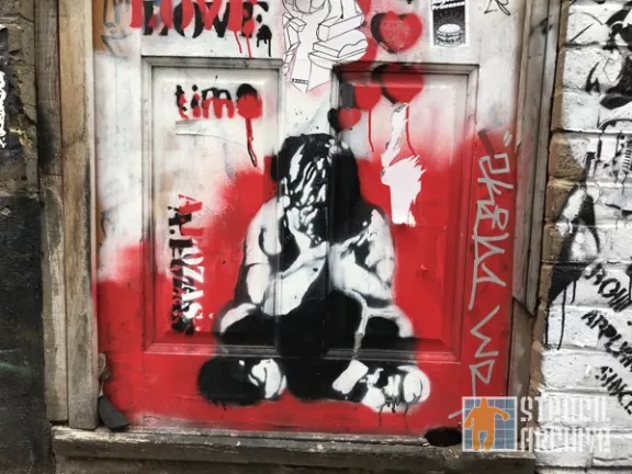 UK London Brick Ln A. Pozas hads in face