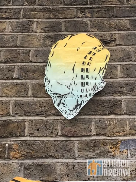 UK London Brick Ln windows into head on paper