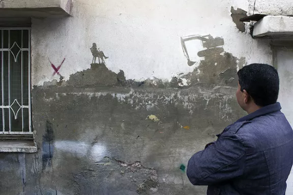 Pejac Aman JO Palestine Watching destruction