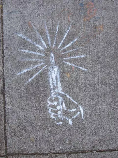 Todd Hanson hand holding candle