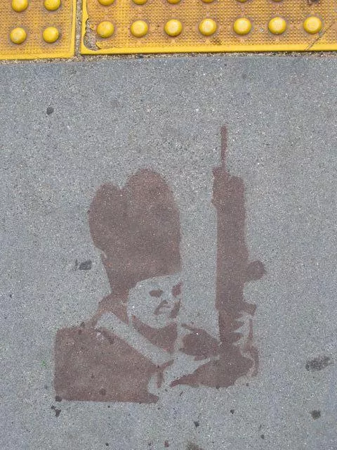 SF Mission Dolores Park pope with gun