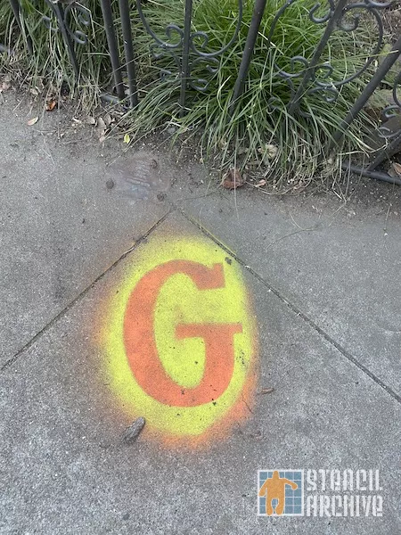 SF Mission Rainbow Coop letter G