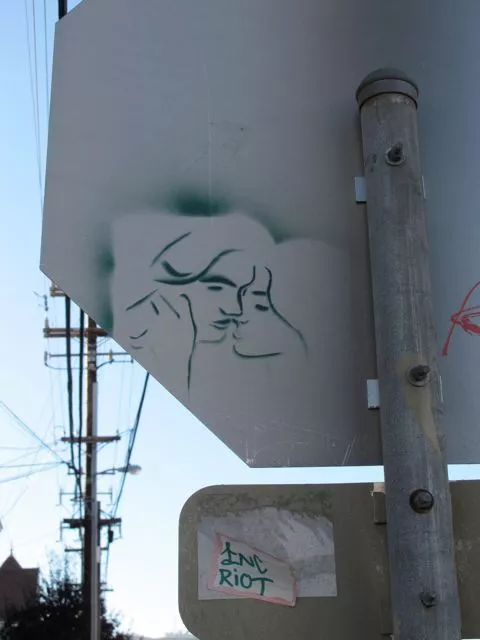 SF Mission kissing couple