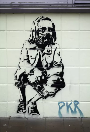 CA East Bay Oakland Lake Park Av PKR Crouched Man